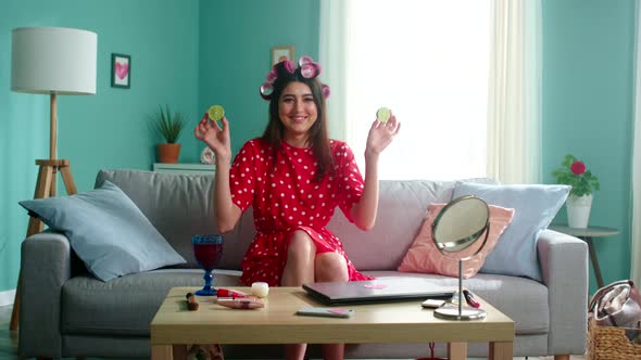 Portrait of Beautiful Woman Playing with Lime Halves