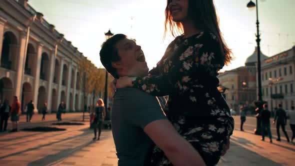 Young Couple Dancing at Sunset Street