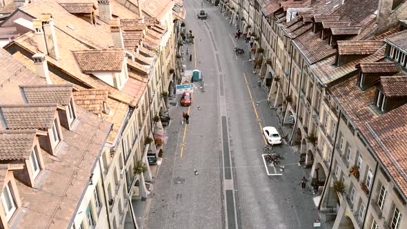 Fly-over Bern's city center street amidst cityscape, Switzerland