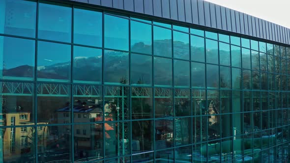 Reflections On Glass Exterior Of Facility Building At Aqua Park Zakopane In Poland. close up, elevat