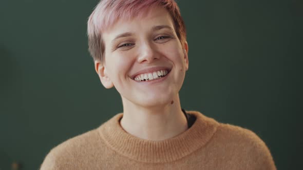 Portrait of Happy Woman Smiling at Camera