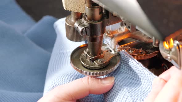 Female Hands Working on Tailoring