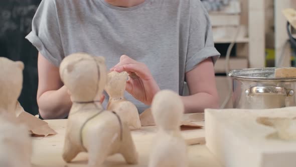 Woman Making Papier-Mache Horse