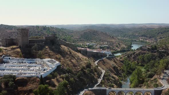 Medieval Castle Of Mertola With Guadiana River And Mountain Views During Summer In Portugal. - aeria