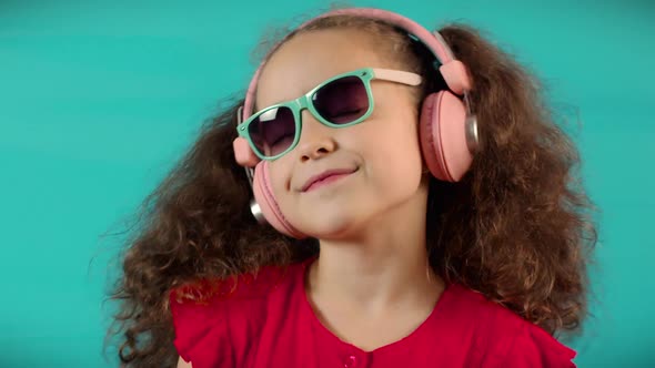Portrait Little Girl Headphones Listening Music