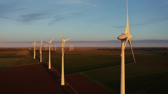 Horizontal Panning From a Drone View of a Wind Farm Among Fields