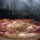 Delicious Fresh Italian Pizza On A  Black Background With The Effect Of Light Inscription Pizza - VideoHive Item for Sale