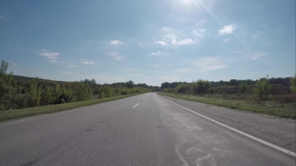 Driving On The Highway Near The Forest