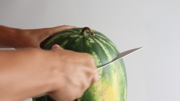 Ripe Watermelon Cut With a Knife.