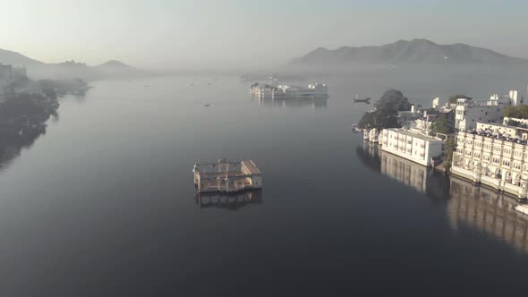 Fly over Arsi Vilas, Lake Pichola , Udaipur, India. Scenic aerial forward 