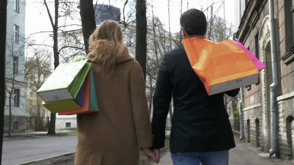 Young Couple With Shopping Bags