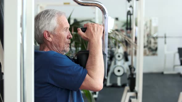 Elderly Fitness Athlete Doing Chest Exercises.