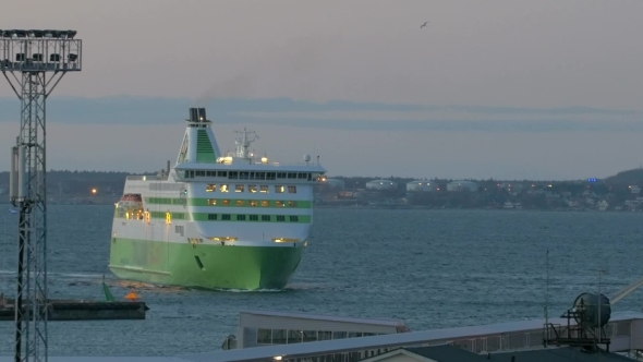 Cruise Ship Sailing To Port In The Evening alt