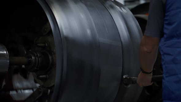 Tyre Production Factory Employee Controlling Manufacturing Process Closeup