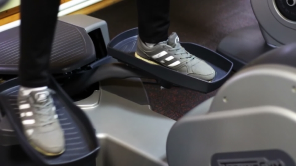 Girl On The Fitness Trainer At The Gym