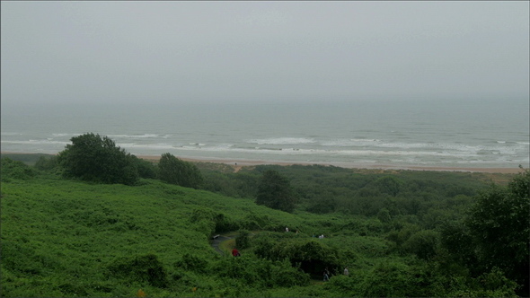 The Normandy Beach with Green View on the Moutain