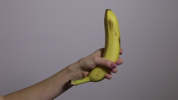 Woman Cleans Banana