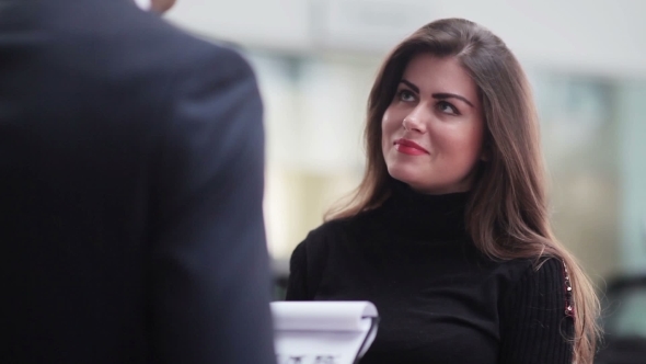 Beautiful Girl Talking To a Sales Manager alt