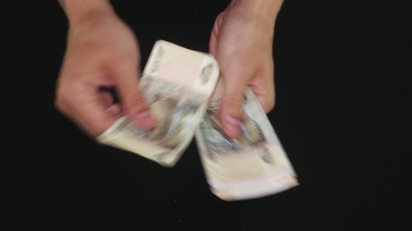 Hands Showing Of a Lot Of Money. Counting 