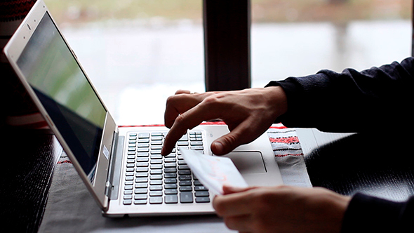 Man Working On Laptop