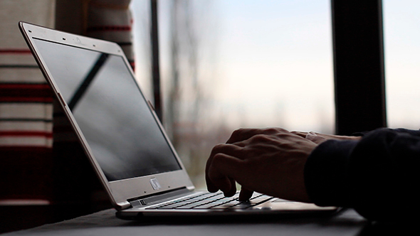 Man Working On Laptop