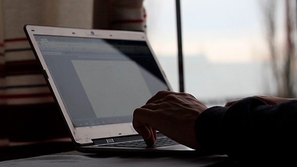 Man Working On Laptop