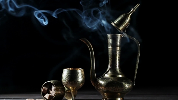Metal Pot And Cup With Moroccan Tea And Smoke