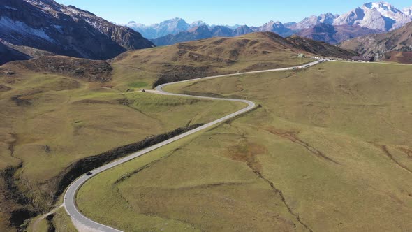 Mountain pass road aerial view with beautiful scenery on background in the Do