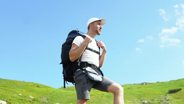 Happy Hiker Winning Reaching Life Goal Success Freedom and Happiness Achievement in Mountains