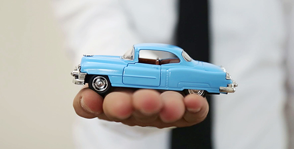 Holding Toy Car