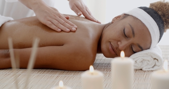 Woman Receiving Back Massage