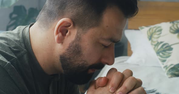 Man Praying and Murmuring