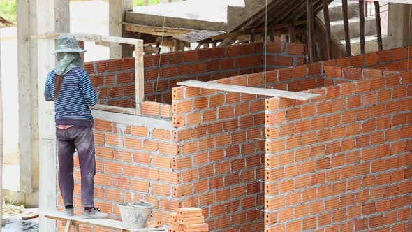 Worker Install Brick For New House 1