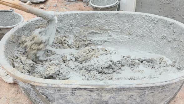 Labor Mixing Concrete For Construction Job 3