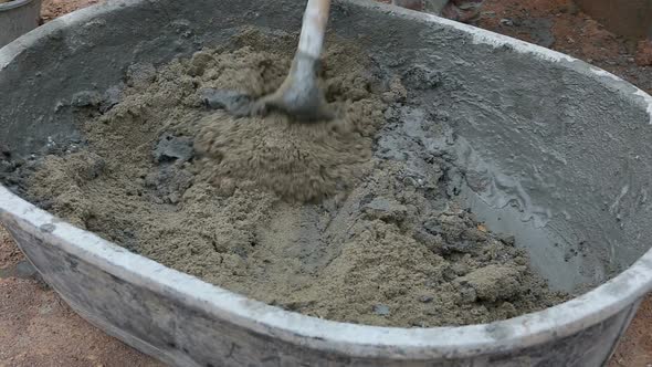 Labor Mixing Concrete For Construction Job 5