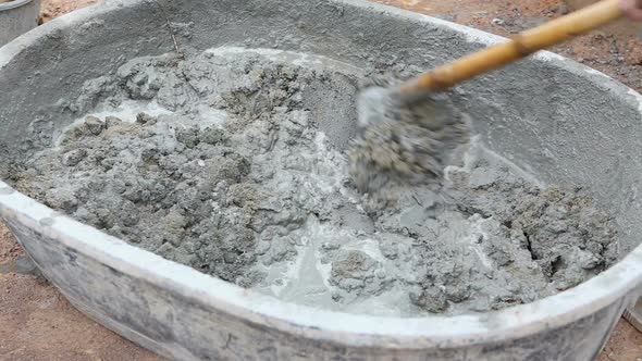 Labor Mixing Concrete For Construction Job 6