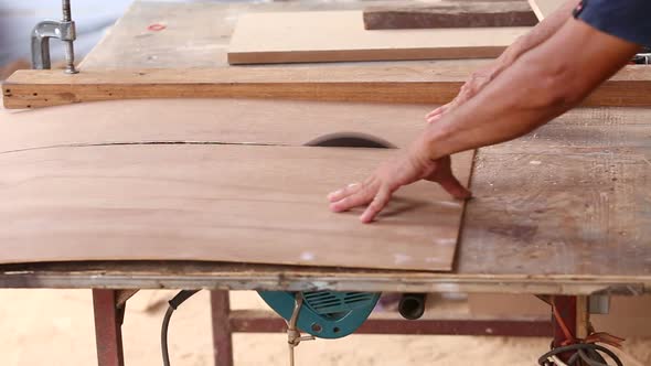 Carpenter Use Saw Cut Wood For Make New Furniture 5