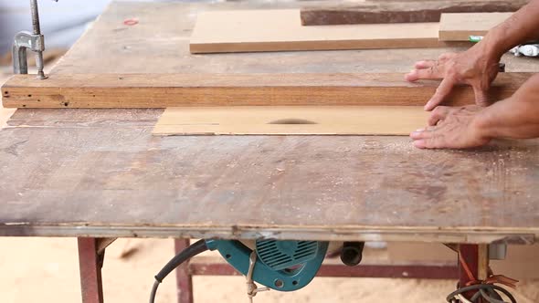 Carpenter Use Saw Cut Wood For Make New Furniture 6