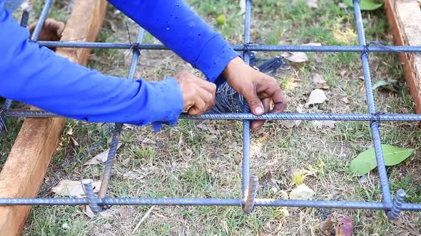 Worker Bending And Bundle Steel For Construction Job 4