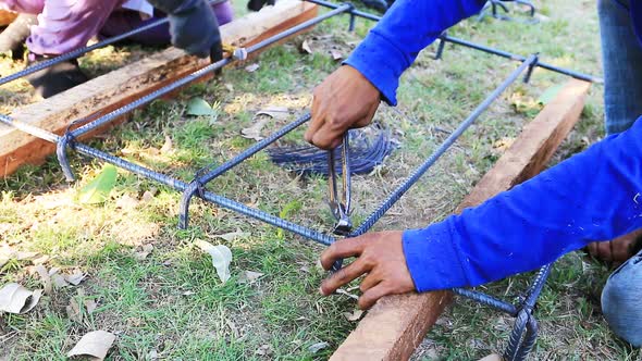 Worker Bending And Bundle Steel For Construction Job 7 alt