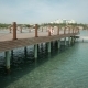 Emty Wooden Bathing Pier With Lifelines With Beach - VideoHive Item for Sale
