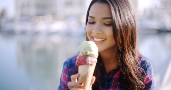 Girl Eating A Delicious Ice Cream