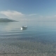 Lonely Row Boat Floating On Clear Water With Small - VideoHive Item for Sale