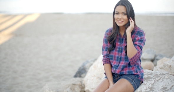 Elegant Woman Posing On The Beach alt