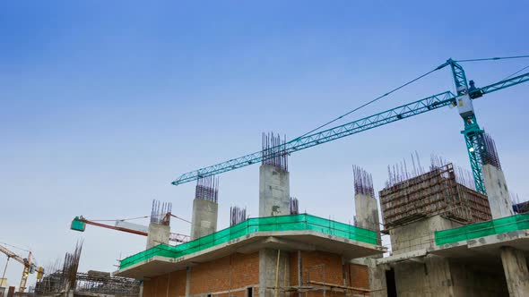 Time-Lapse Crane Working In Construction Site