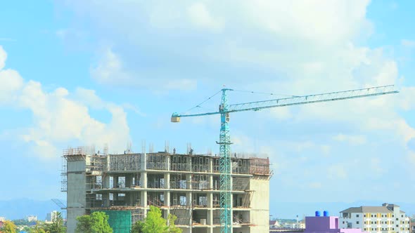 Time-Lapse Crane Working On Construction Site 4