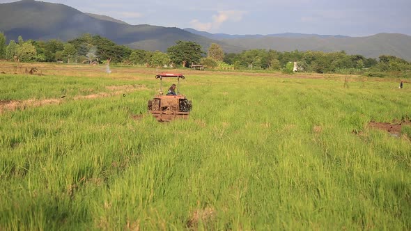 Tractors Preparing Land For Sowing 2