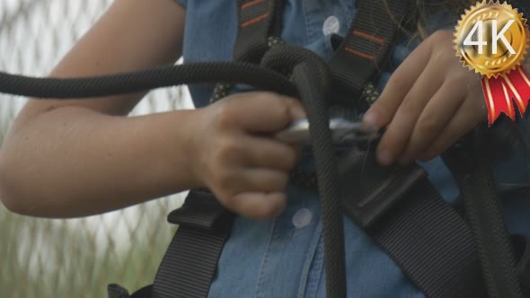 Little Girl Gets Ready to Slide Down