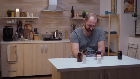 Stressed Man Searching Medicine Information