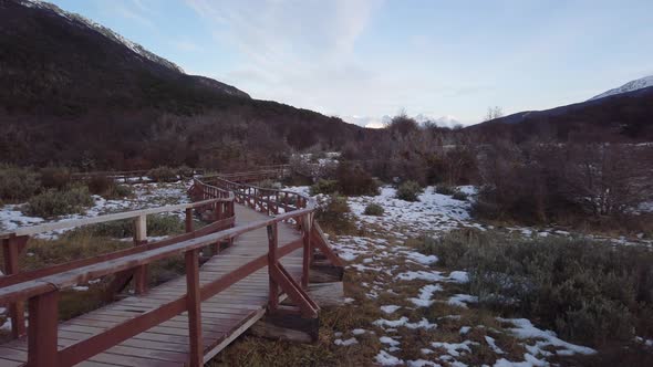 PAN RIGHT Wooden walkway and Lapataia Bay on Tierra del Fuego National Park